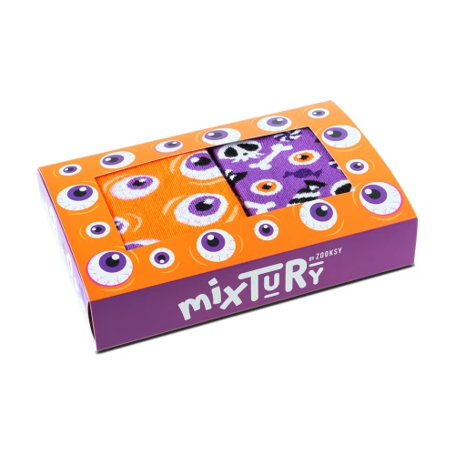 Kolorowy zestaw dziecięcych skarpetek mixTURY Halloween w pudełku. Dwie pary skarpet z motywami oczu, czaszek i kości w pomarańczowo-fioletowej tonacji, idealne do stroju na Halloween.